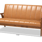 Baxton Studio Nikko Mid-century Modern Tan Faux Leather Upholstered and Walnut Brown finished Wood Sofa