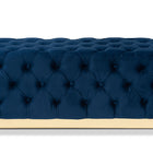 Baxton Studio Corrine Glam and Luxe Navy Blue Velvet Fabric Upholstered and Gold PU Leather Ottoman