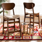 Baxton Studio Katya Mid-Century Modern Sand Fabric Upholstered and Walnut Brown Finished Wood 2-Piece Counter Stool Set