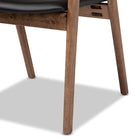 Baxton Studio Harland Mid-Century Modern Black Faux Leather Upholstered and Walnut Brown Finished Wood 7-Piece Dining Set
