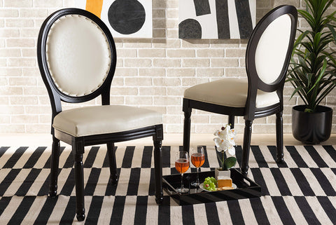 Baxton Studio Louis Traditional French Inspired Beige Faux Leather Upholstered and Black Finished Wood 2-Piece Dining Chair Set