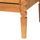 Baxton Studio Lucera Mid-Century Oak Brown Bobbin Wood 4-Drawer Chest