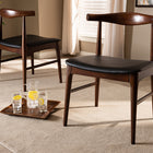 Baxton Studio Eira Mid-Century Modern Black Faux Leather Upholstered Walnut Finished Wood Dining Chair Set of 2