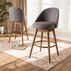Baxton Studio Carra Mid-Century Modern Grey Fabric Upholstered Walnut-Finished Wood Swivel Bar Stool Set of 2