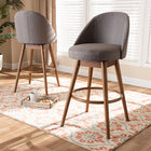 Baxton Studio Carra Mid-Century Modern Grey Fabric Upholstered Walnut-Finished Wood Swivel Bar Stool Set of 2