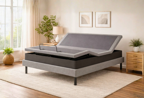 Ergomotion ASCEND High-Low Adjustable Bed with raised headboard on a white background.