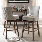 Baxton Studio Gradisca Modern and Contemporary Brown Wood Finishing and Light Beige Fabric Button-Tufted Upholstered 2-Piece Swivel Barstool Set