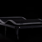 Ergomotion ErgoSportive Smart & Adjustable bed base on a black background.