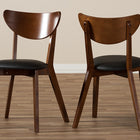 Baxton Studio Sumner Mid-Century Black Faux Leather and Walnut Brown Dining Chair