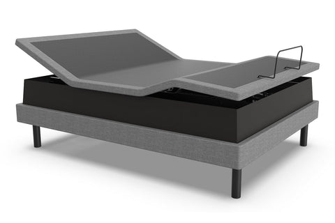 Ergomotion ASCEND High-Low Adjustable Bed with raised headboard on a white background.