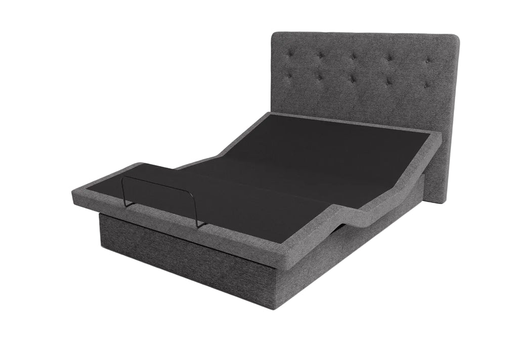 Dawn house bed angled. Gray upholstered bed frame on a light gray background