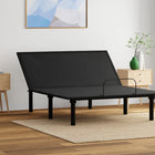 Ergomotion RIO 1.0 Adjustable Bed in a room with wooden floors and light-colored walls.