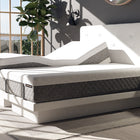 DawnHouse bed with white mattress on a bed frame in a room with a window and plant