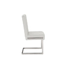 Baxton Studio Toulan Modern and Contemporary White Faux Leather Upholstered Stainless Steel Dining Chair - Dining Room
